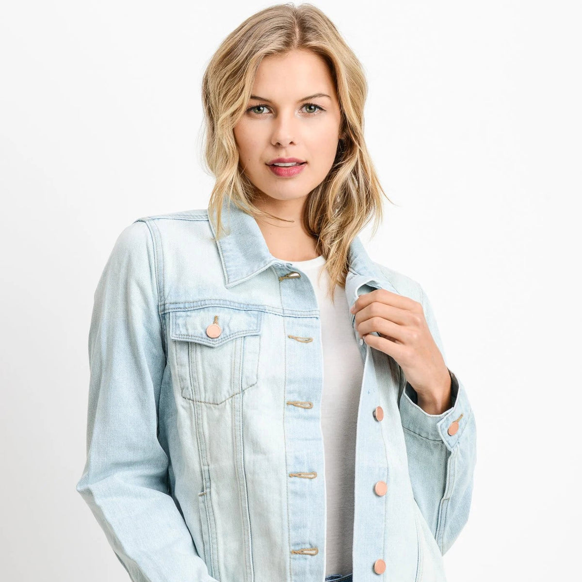 Light wash oversized denim jacket with copper rivets