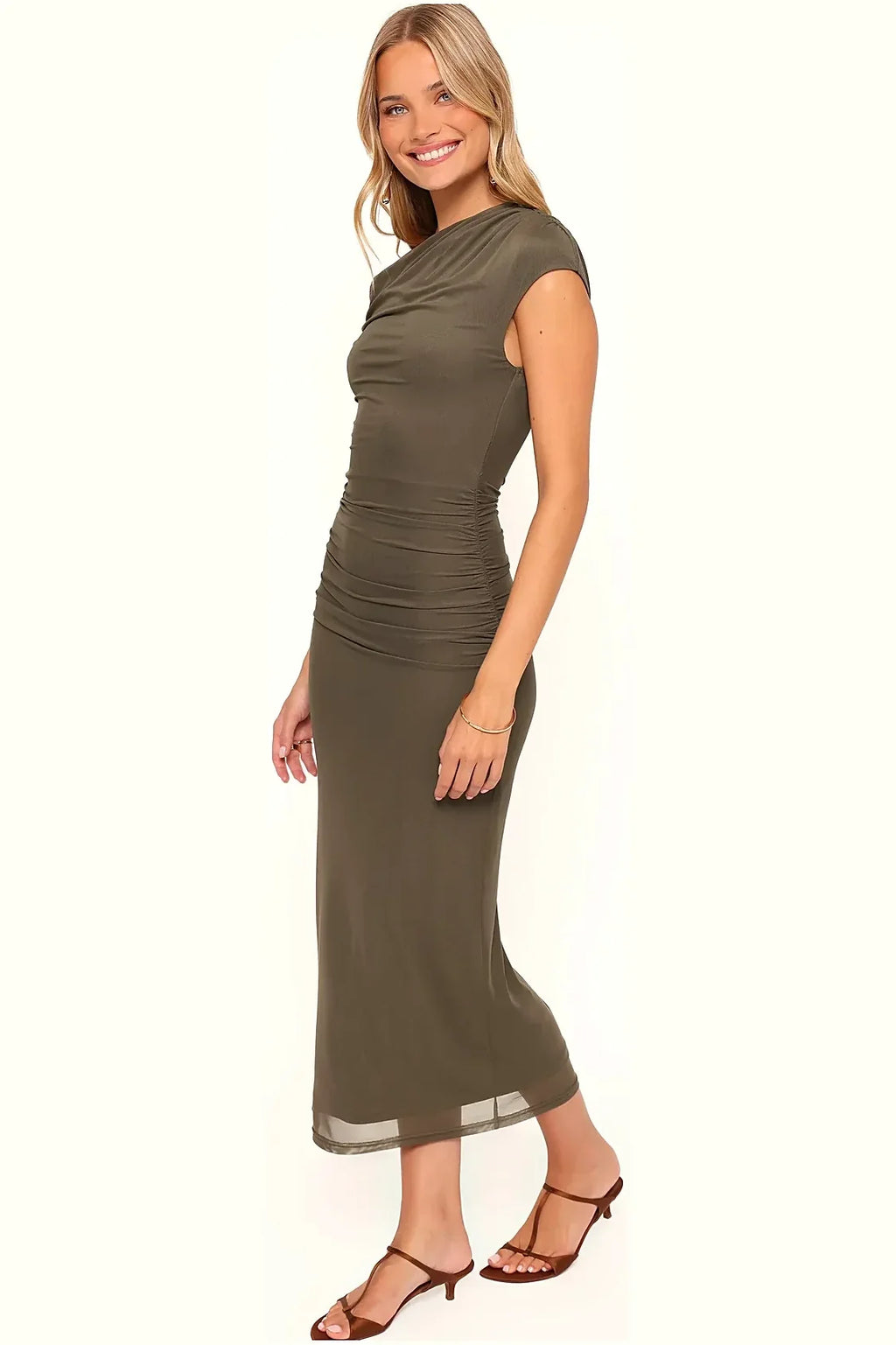 Back view of an olive off-shoulder maxi dress