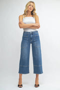 Cropped hem on a black high-rise wide-leg jean