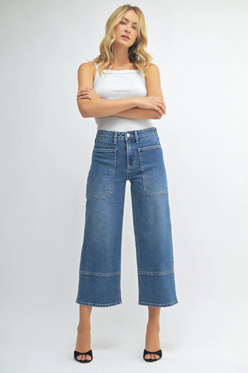Cropped hem on a black high-rise wide-leg jean