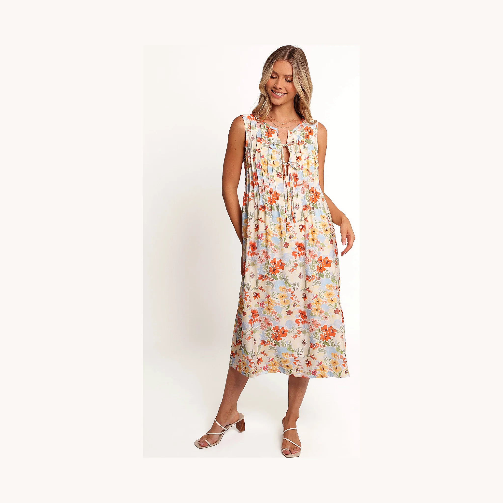 Mid-length flower print dress with pleated accents