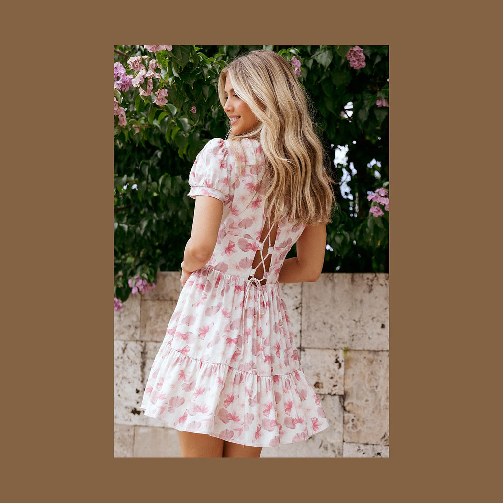 Cream floral mini dress with a soft V-neckline