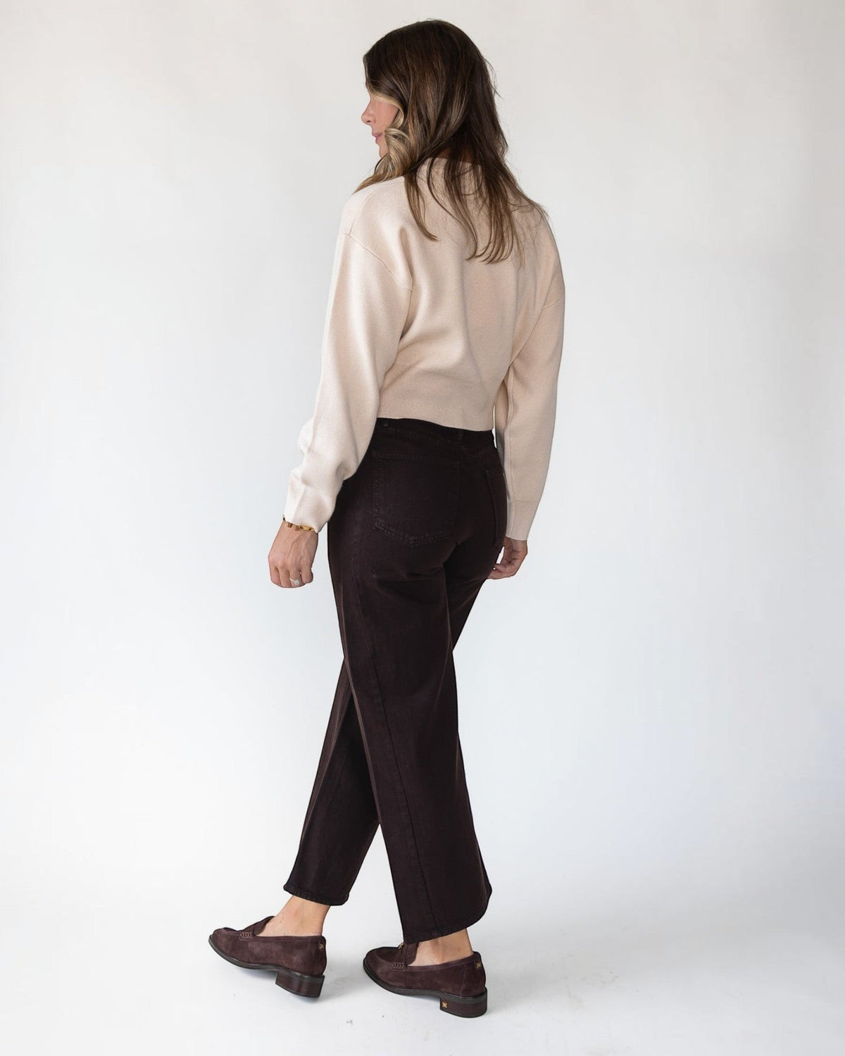 Cropped length and relaxed fit on a lightweight cream cardigan