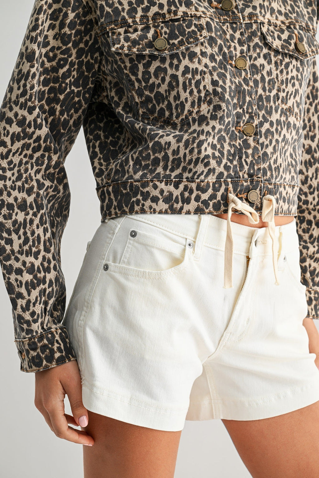 Short body cut to sit above a high-rise waistband