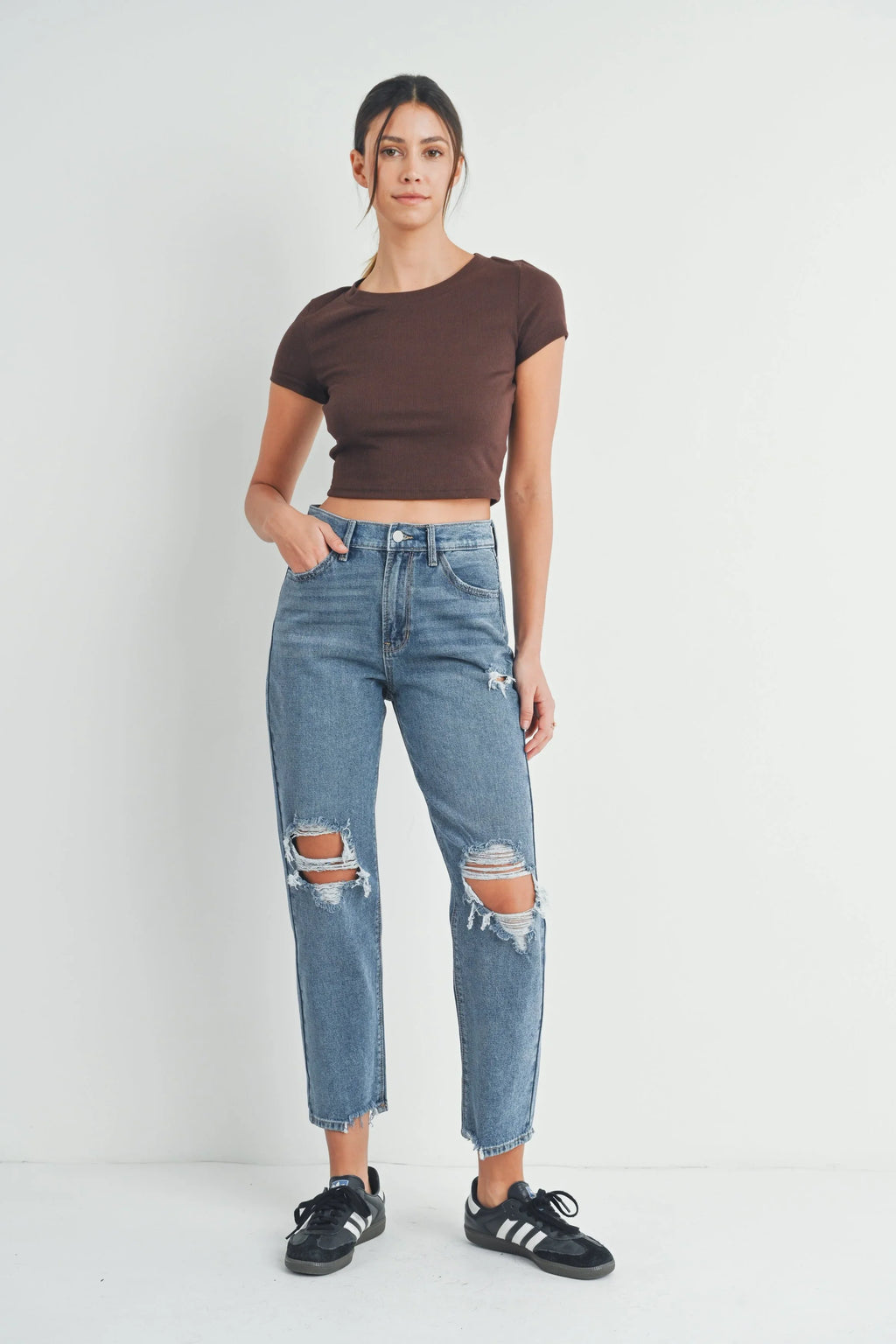 Blown-out knees on a cropped straight leg jean