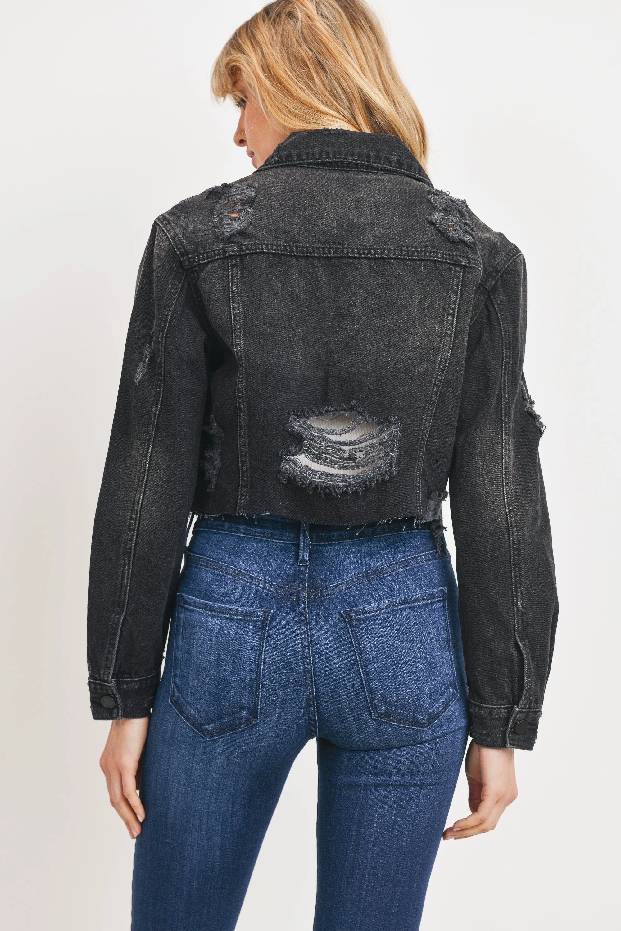 Rigid non-stretch 100% cotton in a washed black denim