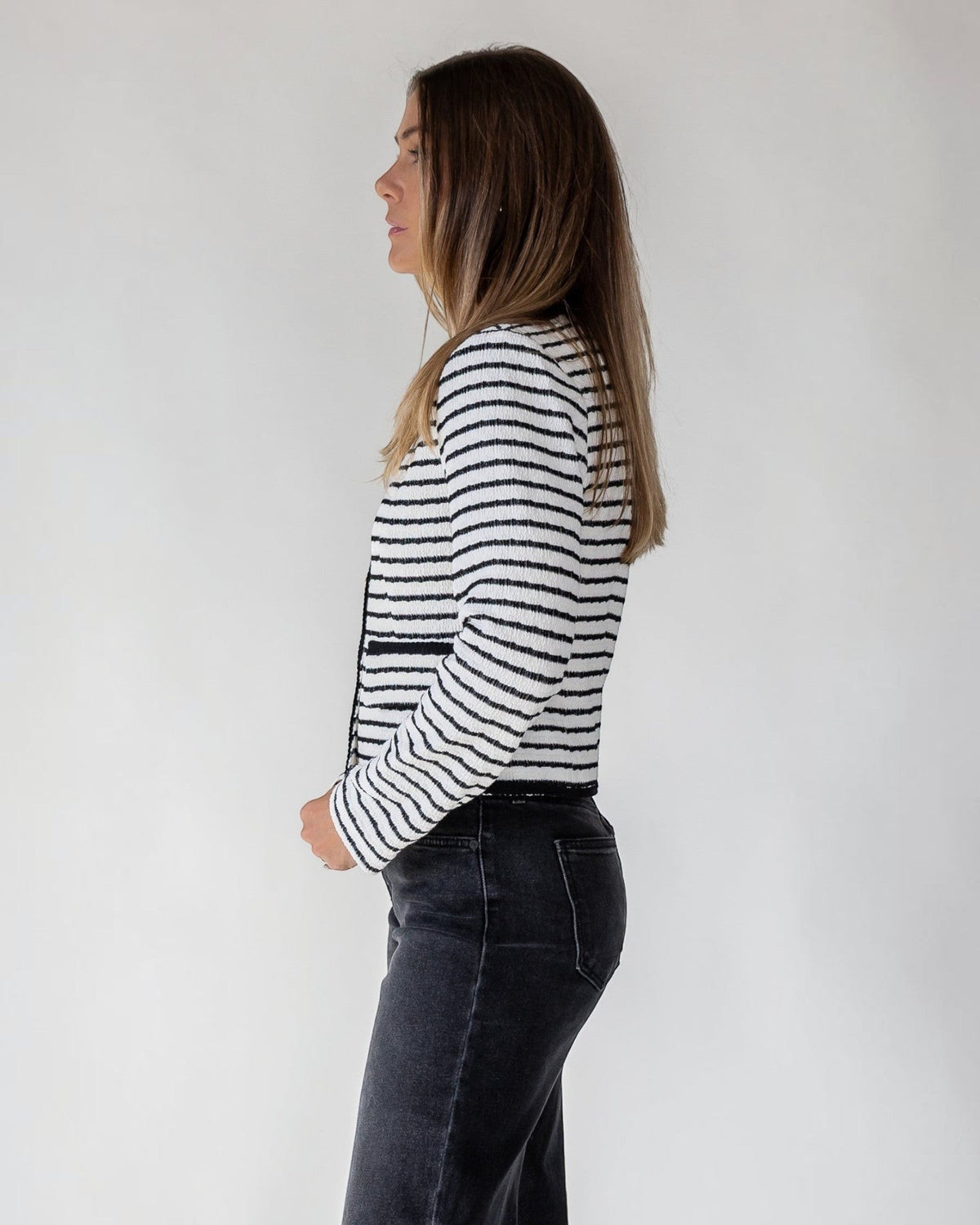 Faux pockets set into the front of a cropped striped knit