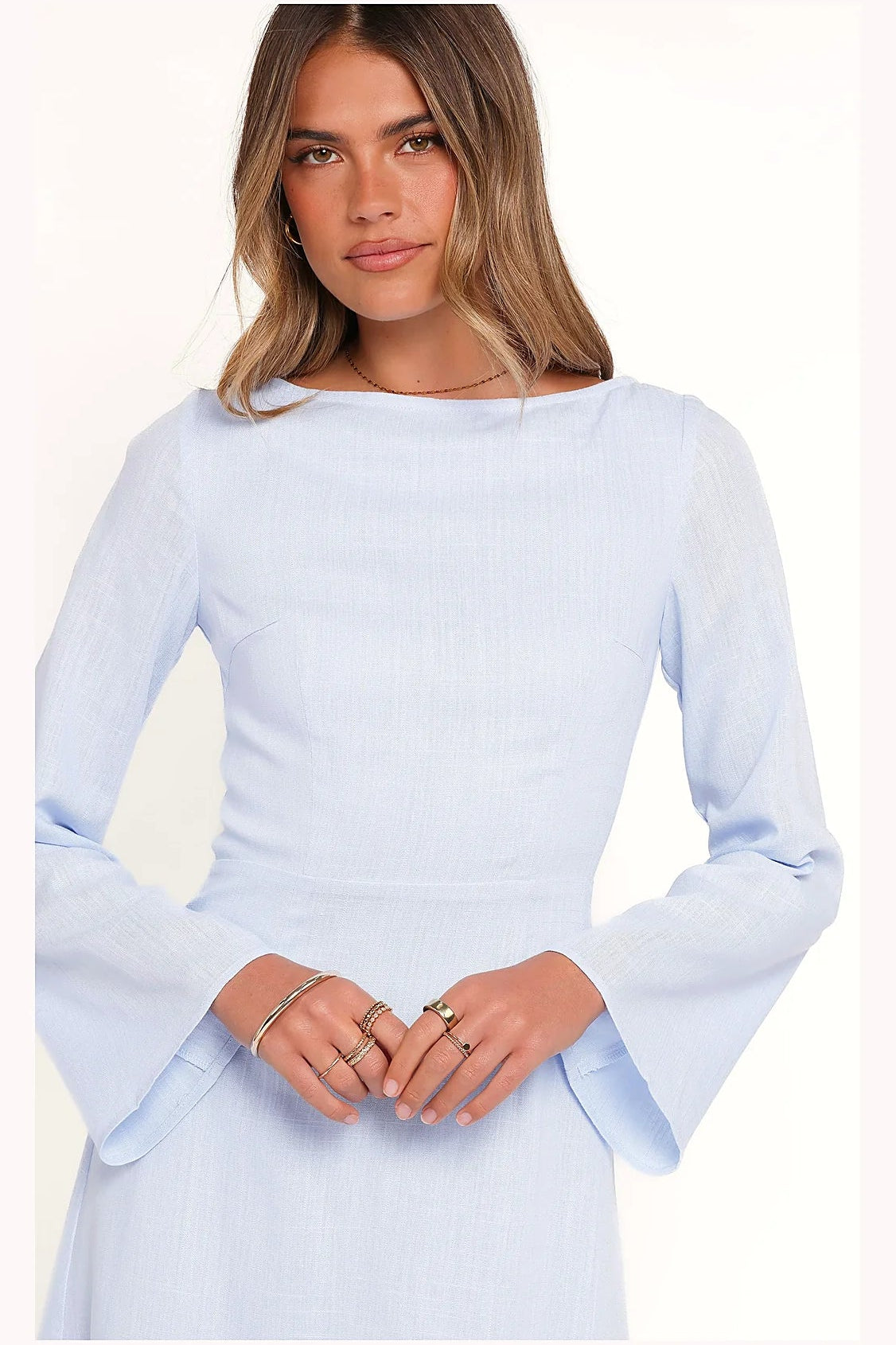 Back view of a periwinkle flare-sleeve mini dress