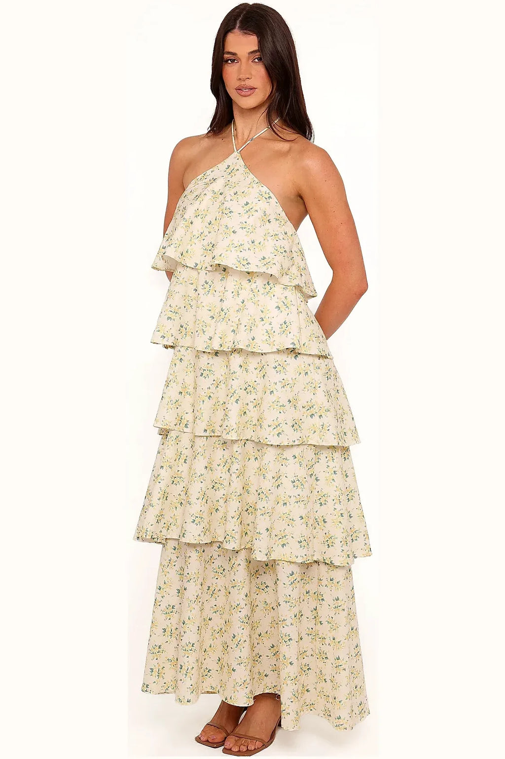 Long yellow floral dress with tiered skirt, side angle