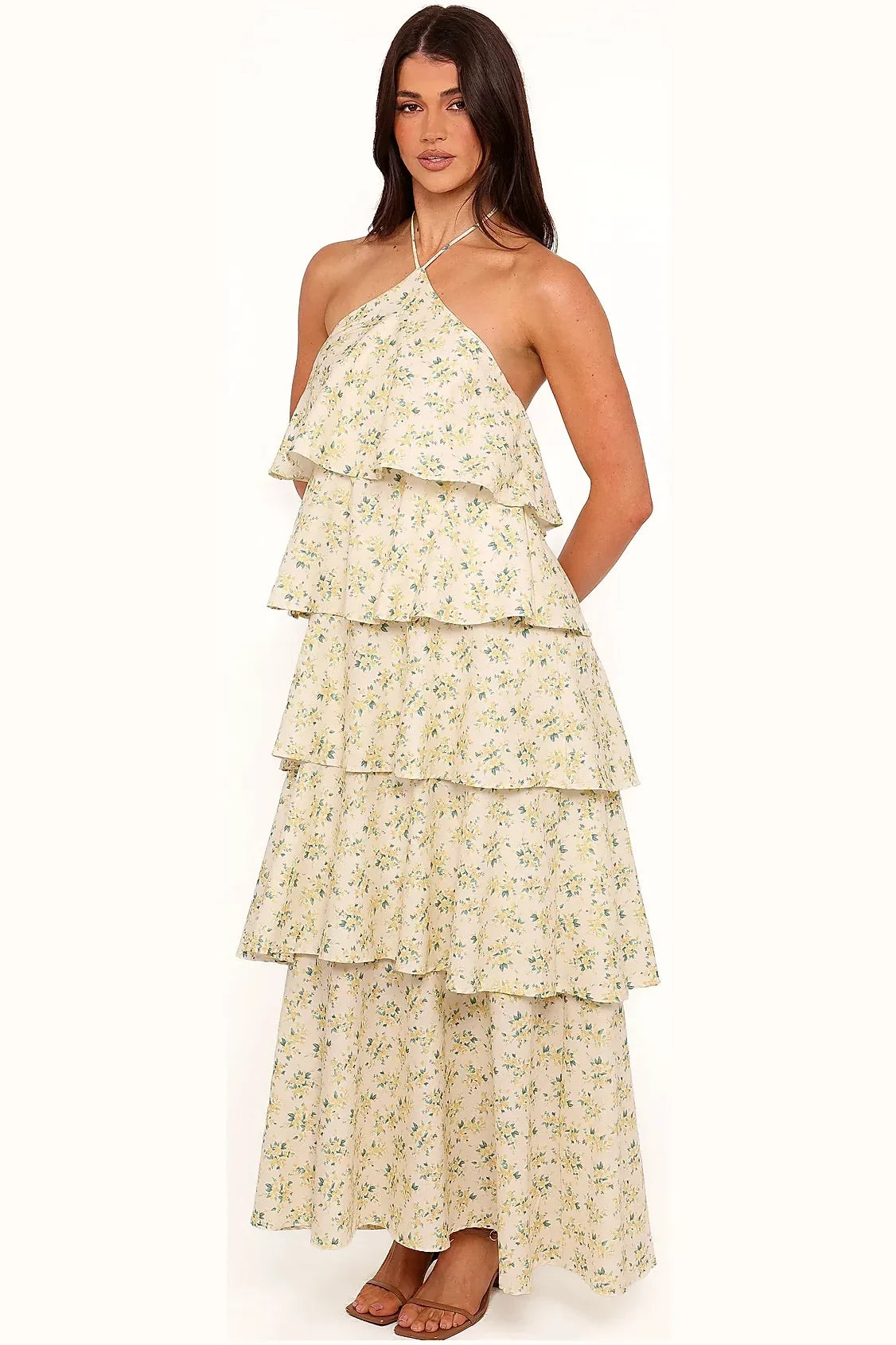 Long yellow floral dress with tiered skirt, side angle