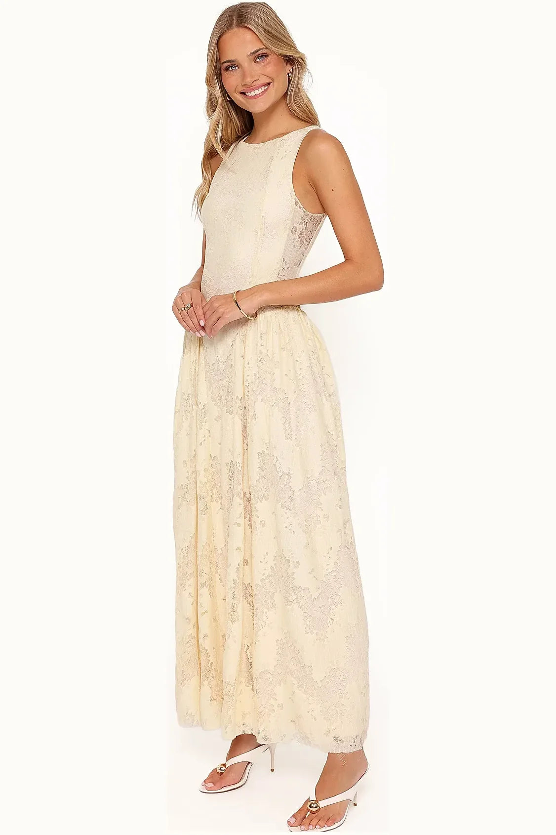 Butter yellow lace maxi dress worn front-on