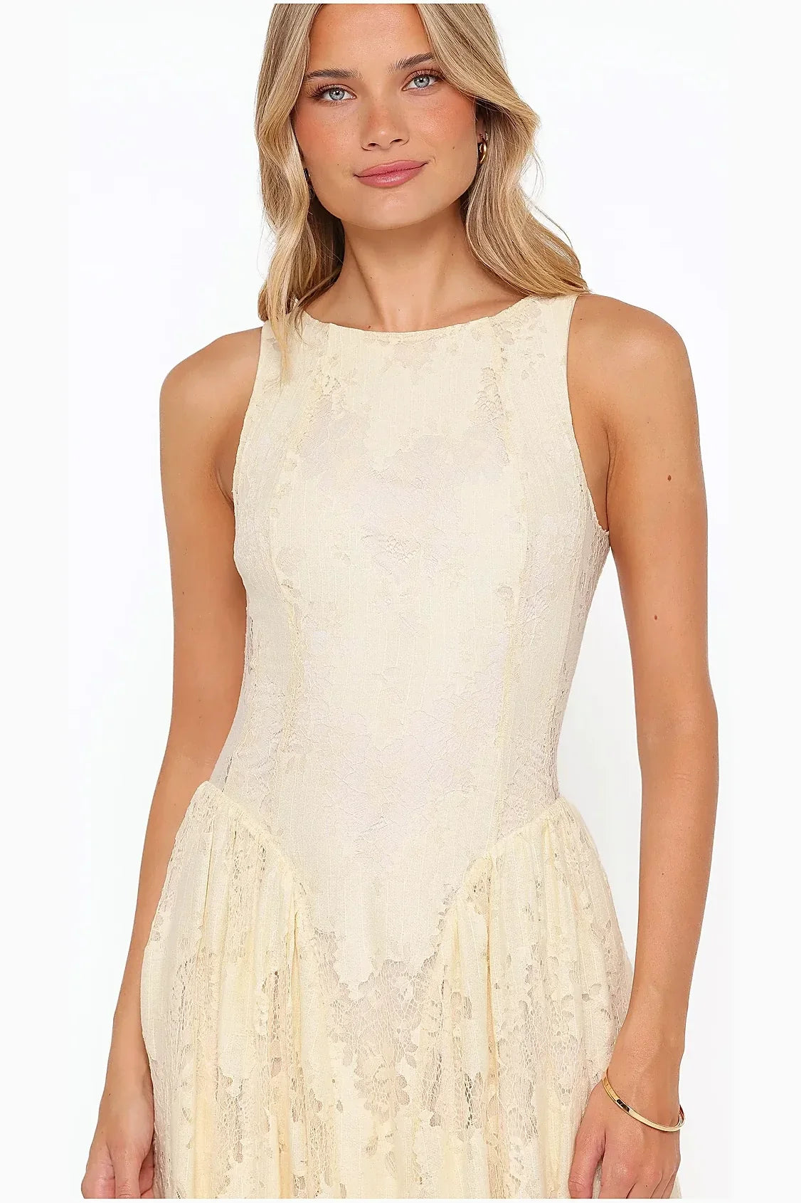 Butter yellow lace maxi dress from a side angle