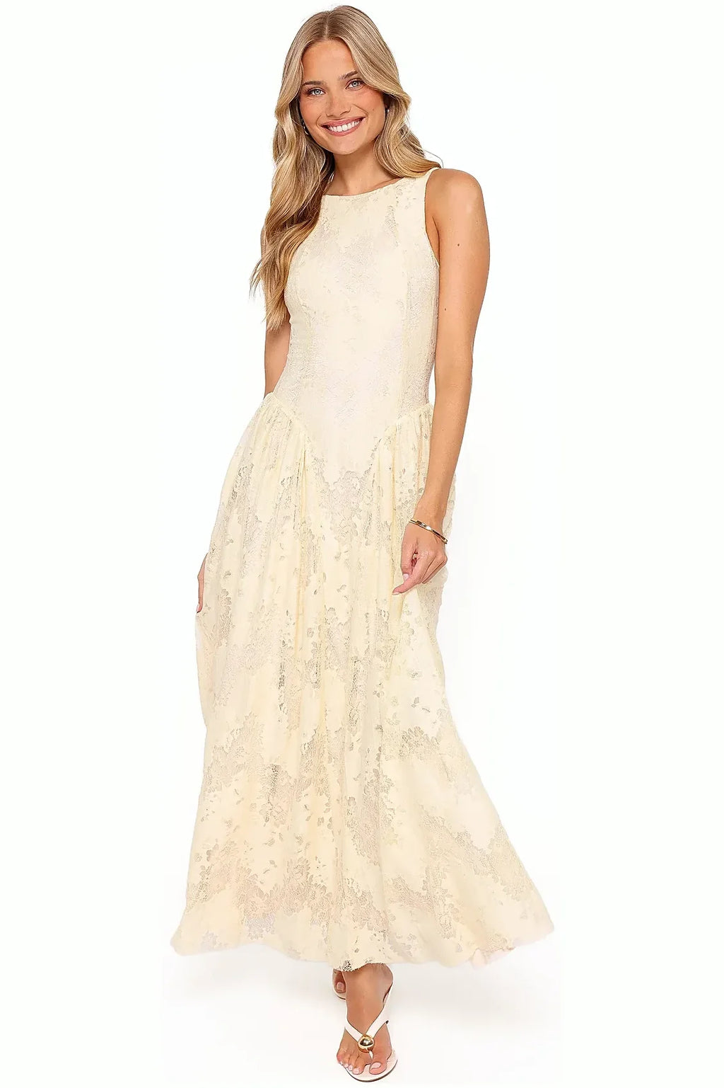 Rear view of the butter yellow lace maxi dress