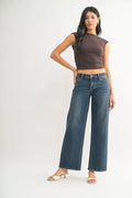 Authentically faded dark wash with subtle whiskering at the front