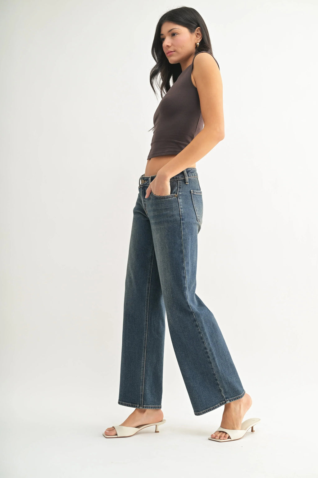 Clean-cut hem finishing a low-rise straight leg jean