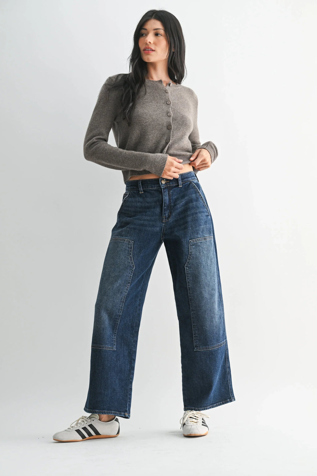 Patch panel detailing set across the front of a wide-leg jean