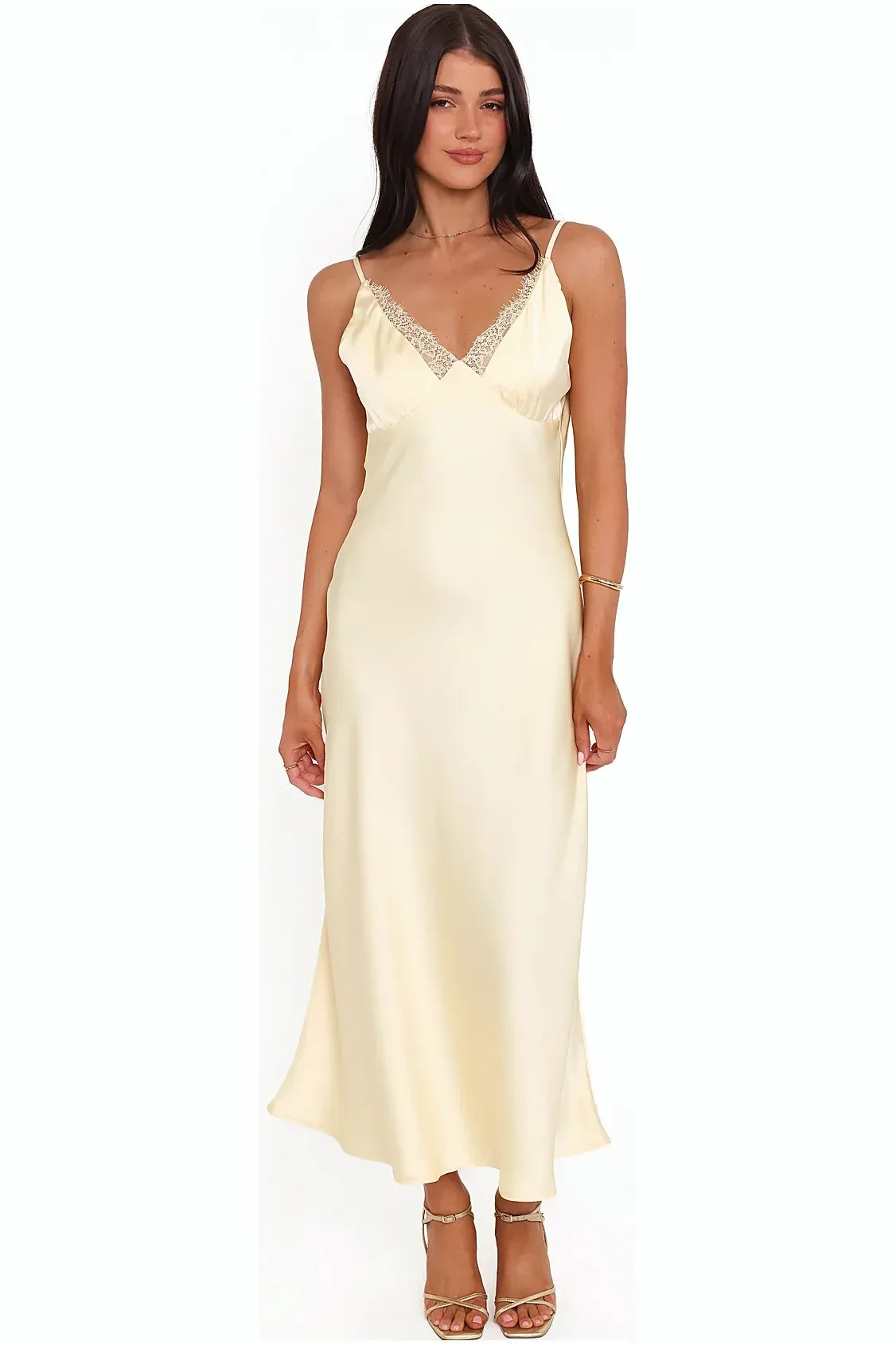 Side view of a butter yellow satin midi dress
