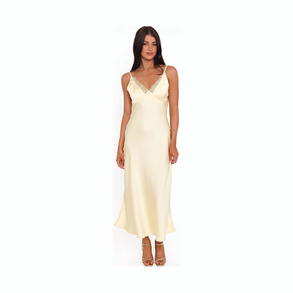 Mid-length pale yellow dress with a satin sheen