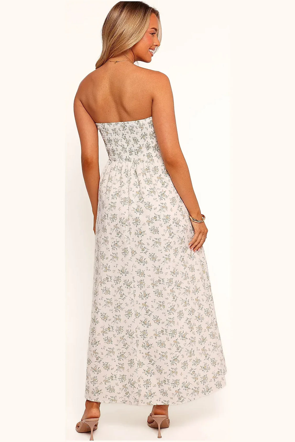 Back view of a green floral cotton maxi dress