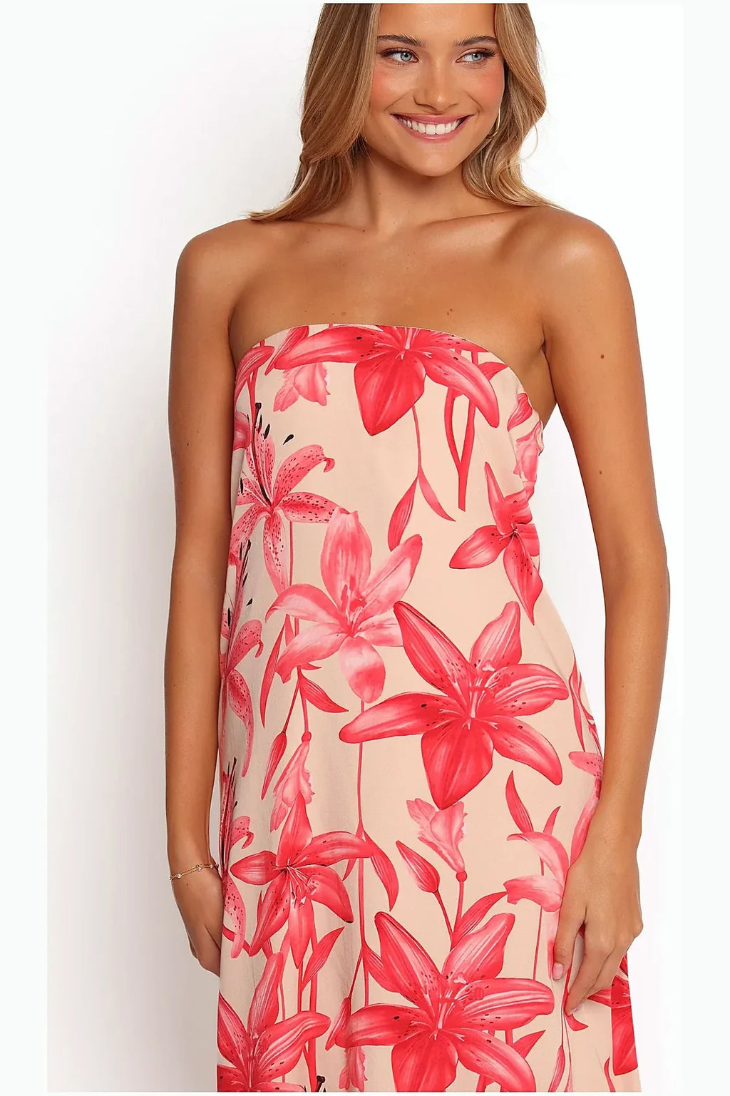 Rear view of a long pink floral strapless dress