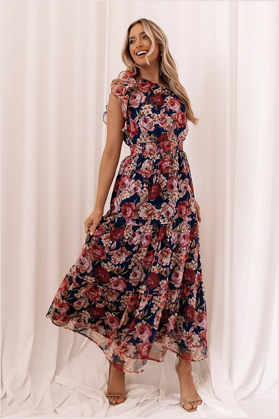 Back of the navy floral maxi dress with one-shoulder neckline