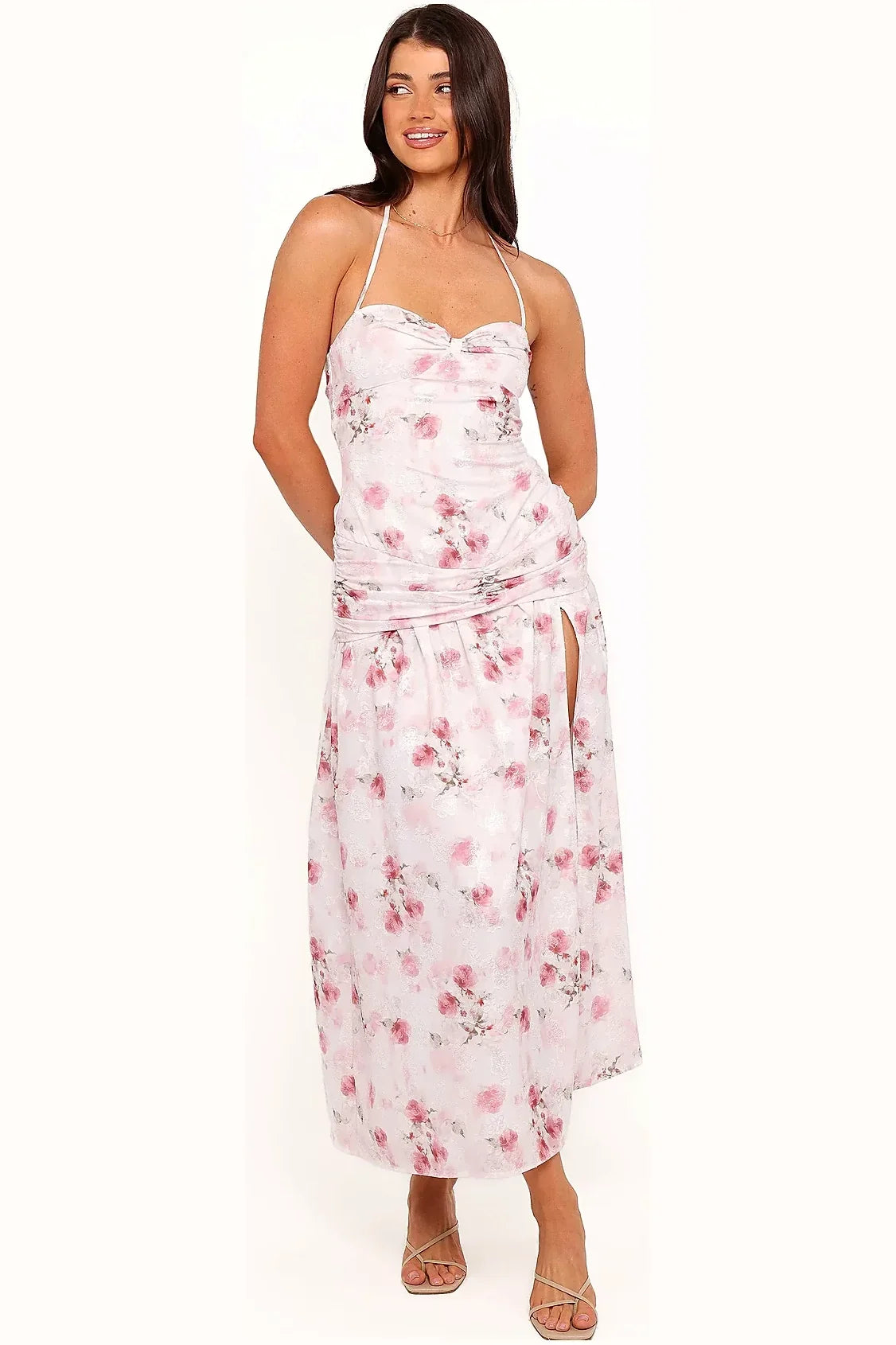 Mid-length floral dress with a high split in the skirt