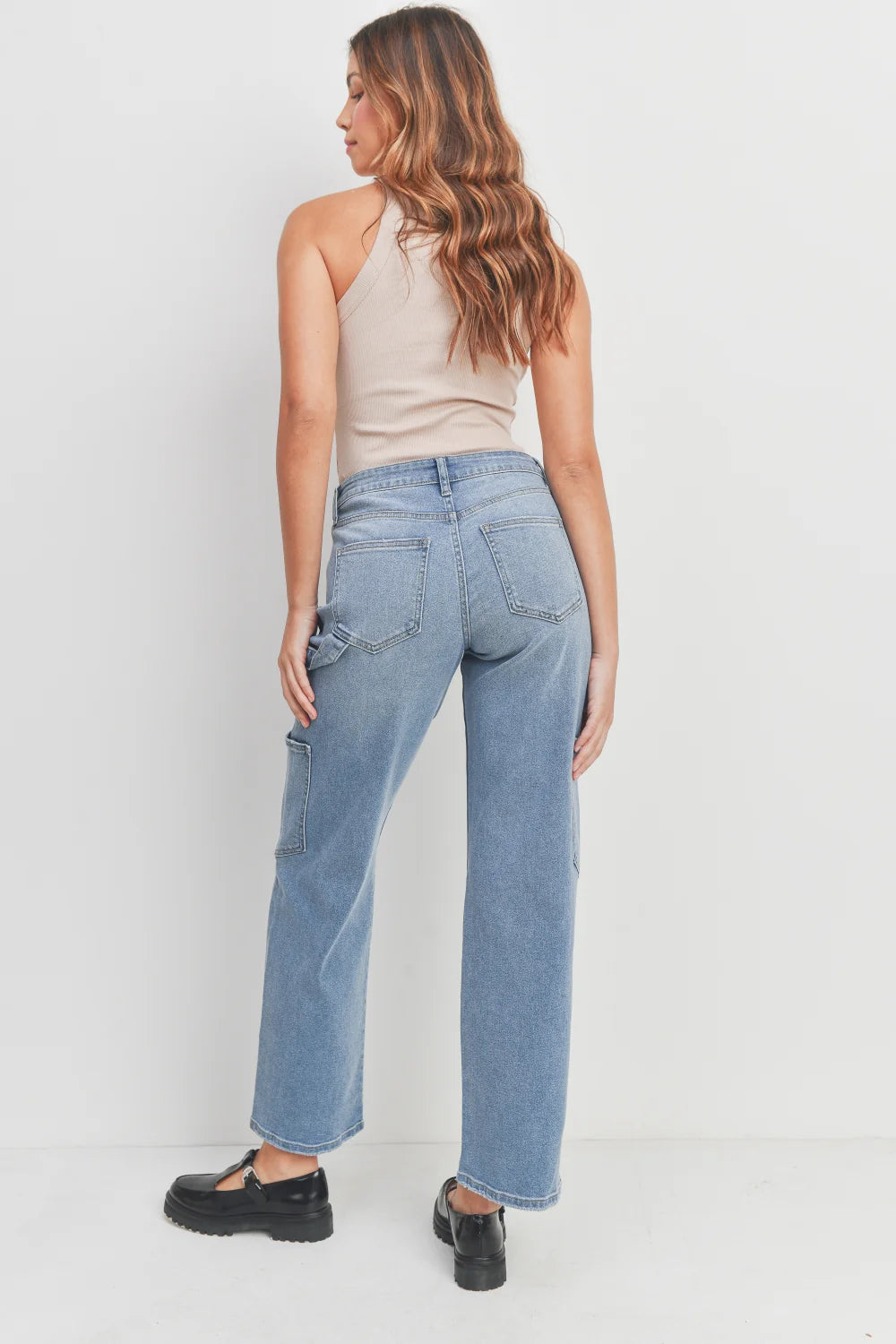 High rise waist above a structured wide leg