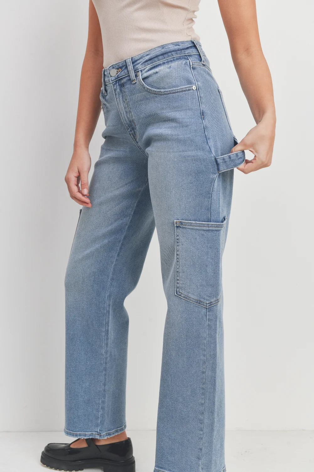Narrow eight inch hem opening on a wide-leg cargo jean