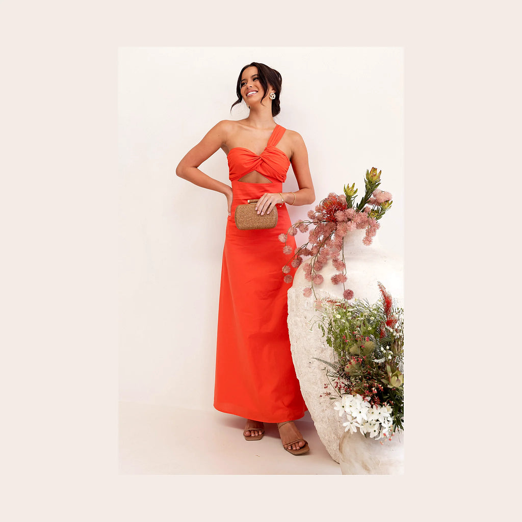 Bright orange long dress with a twist detail at the bust