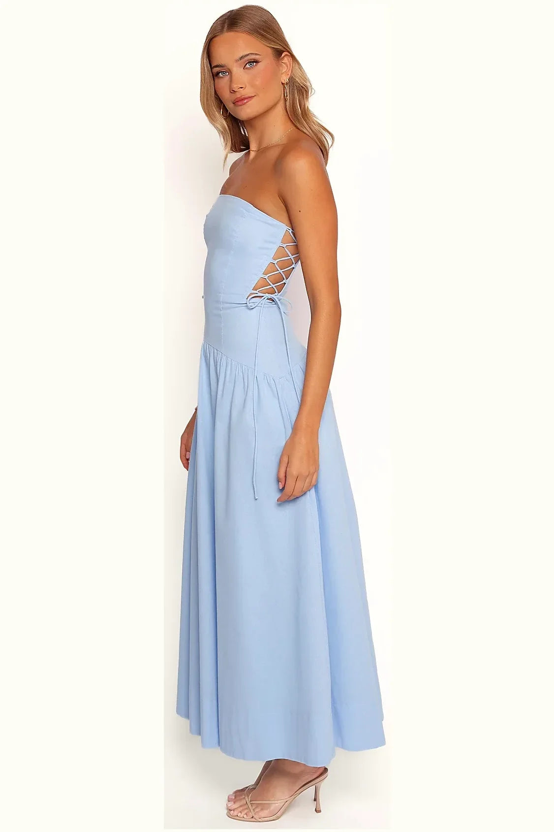 Close-up of the side-tie detail on the blue maxi dress