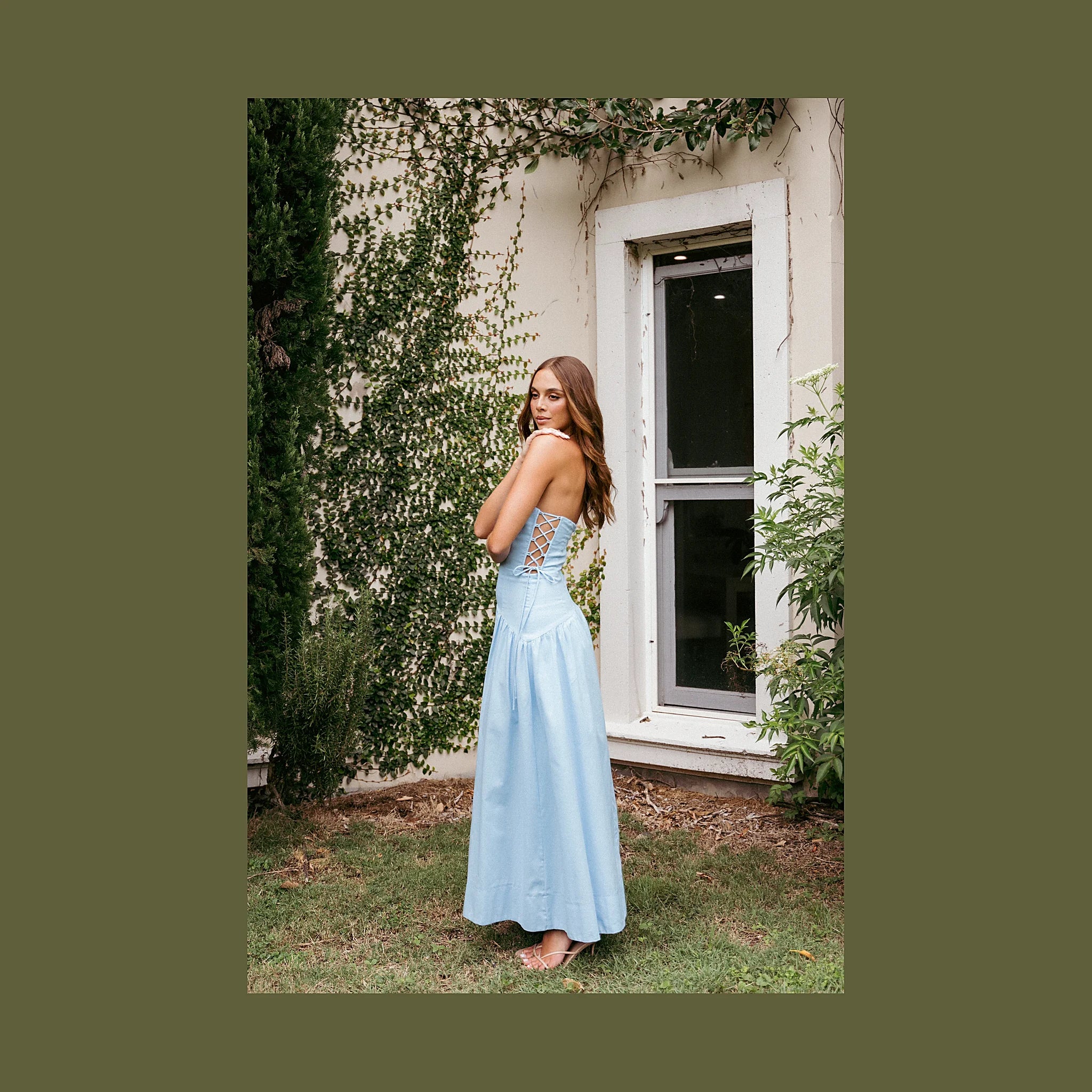 Long blue dress with a side tie-up feature