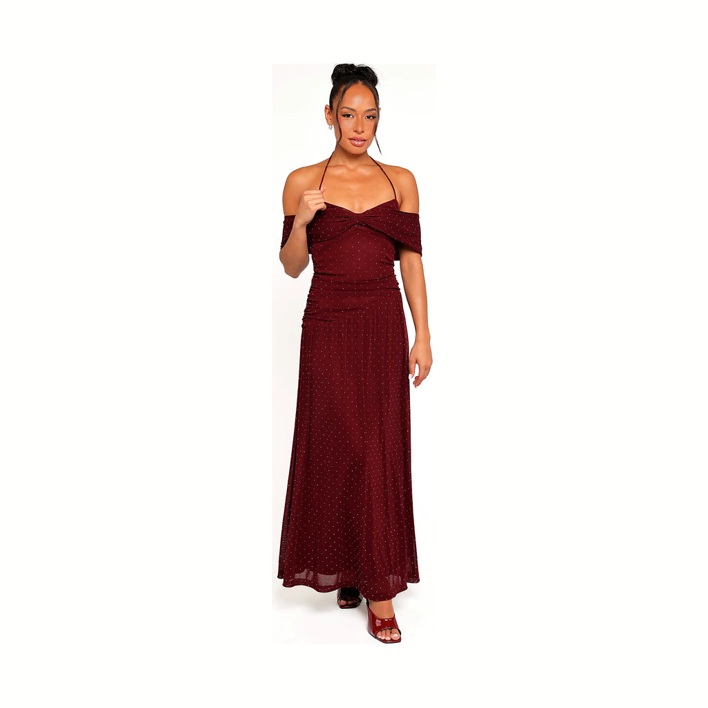 Burgundy maxi dress with a white polka dot print and a tie halterneck