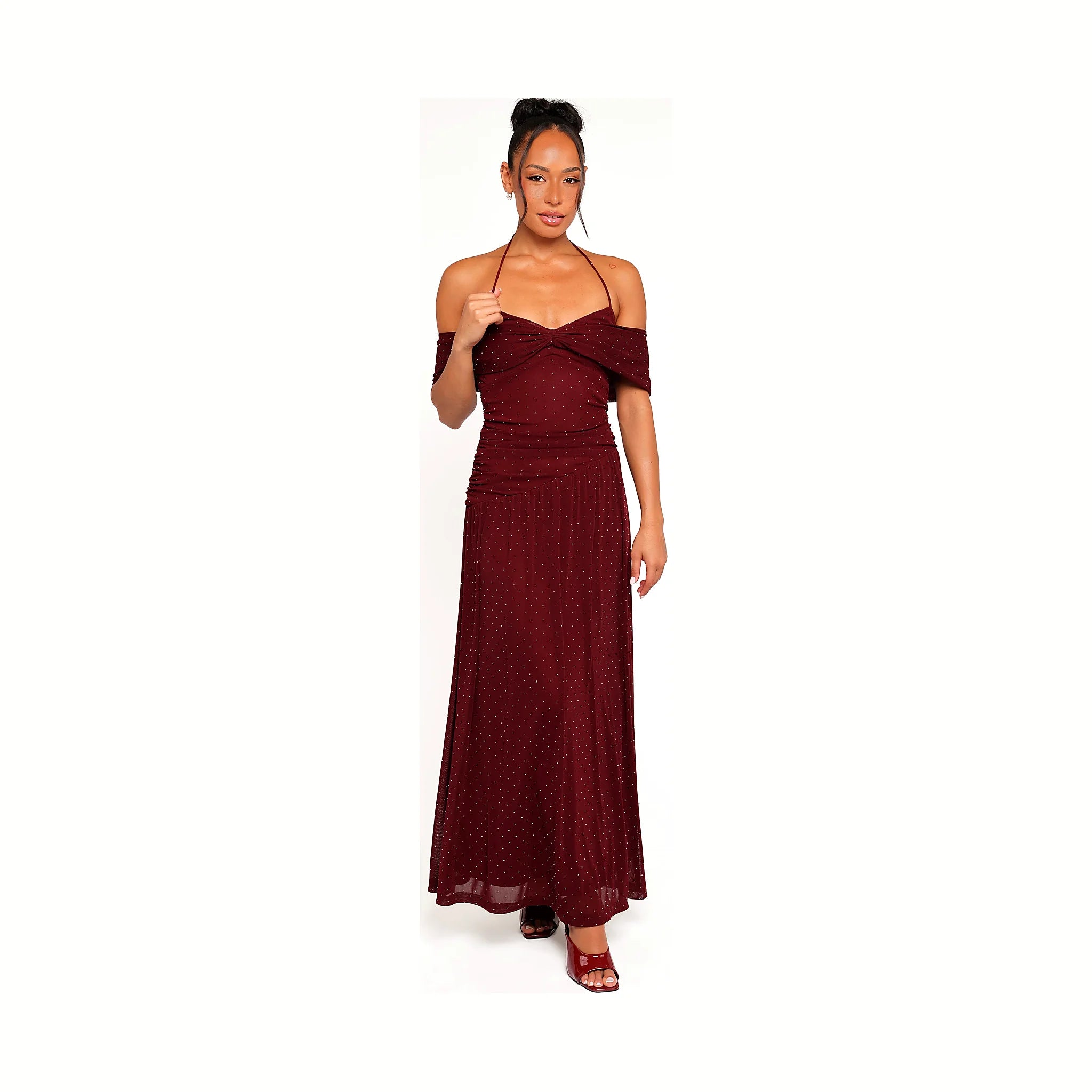 Burgundy maxi dress with a white polka dot print and a tie halterneck