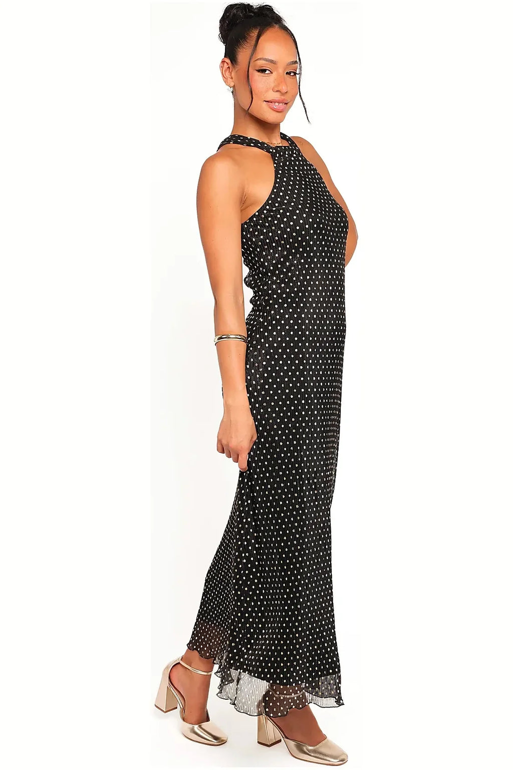 Plisse pleat and gold polka dot detail on the black maxi dress