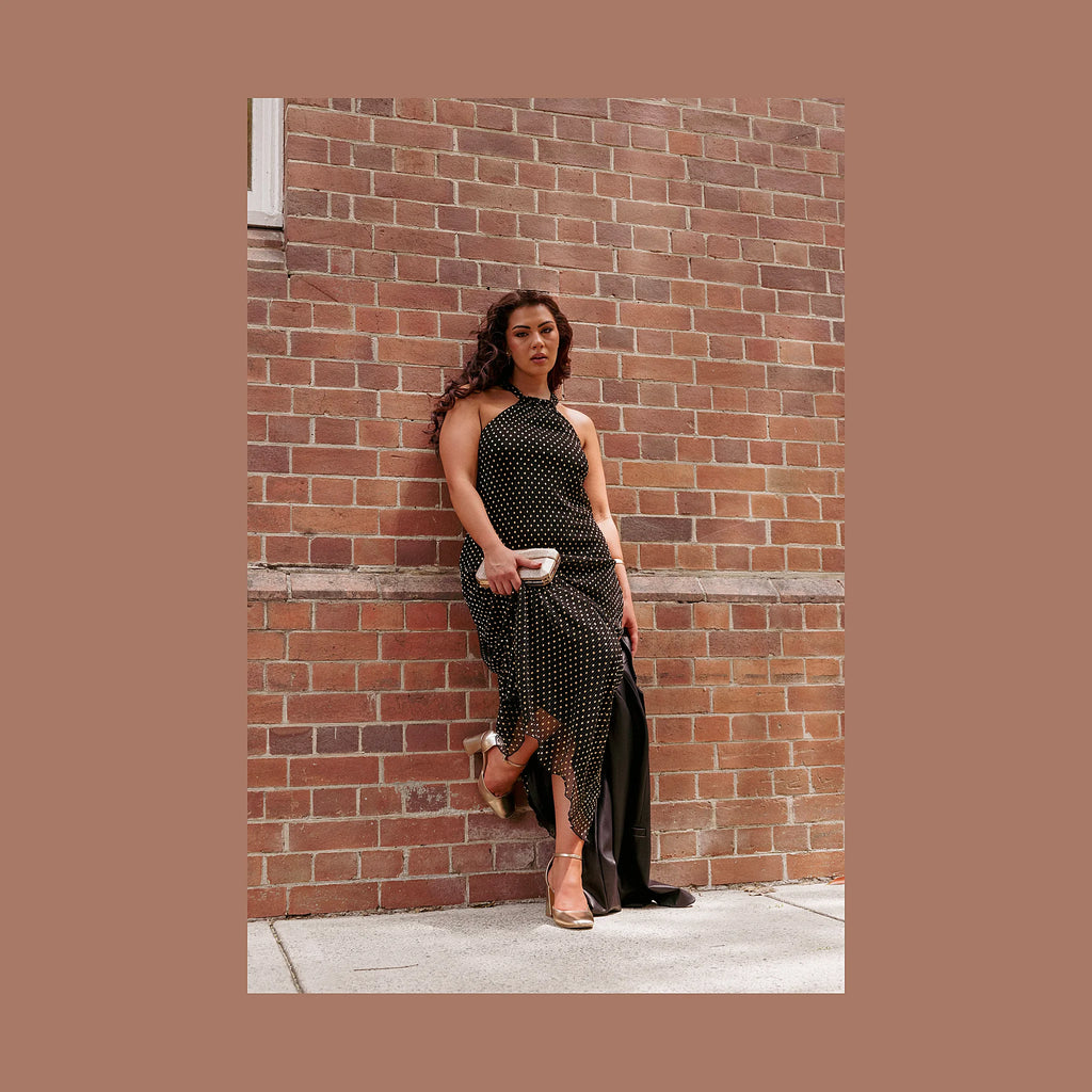 Sleeveless halterneck maxi dress with fine pleating throughout