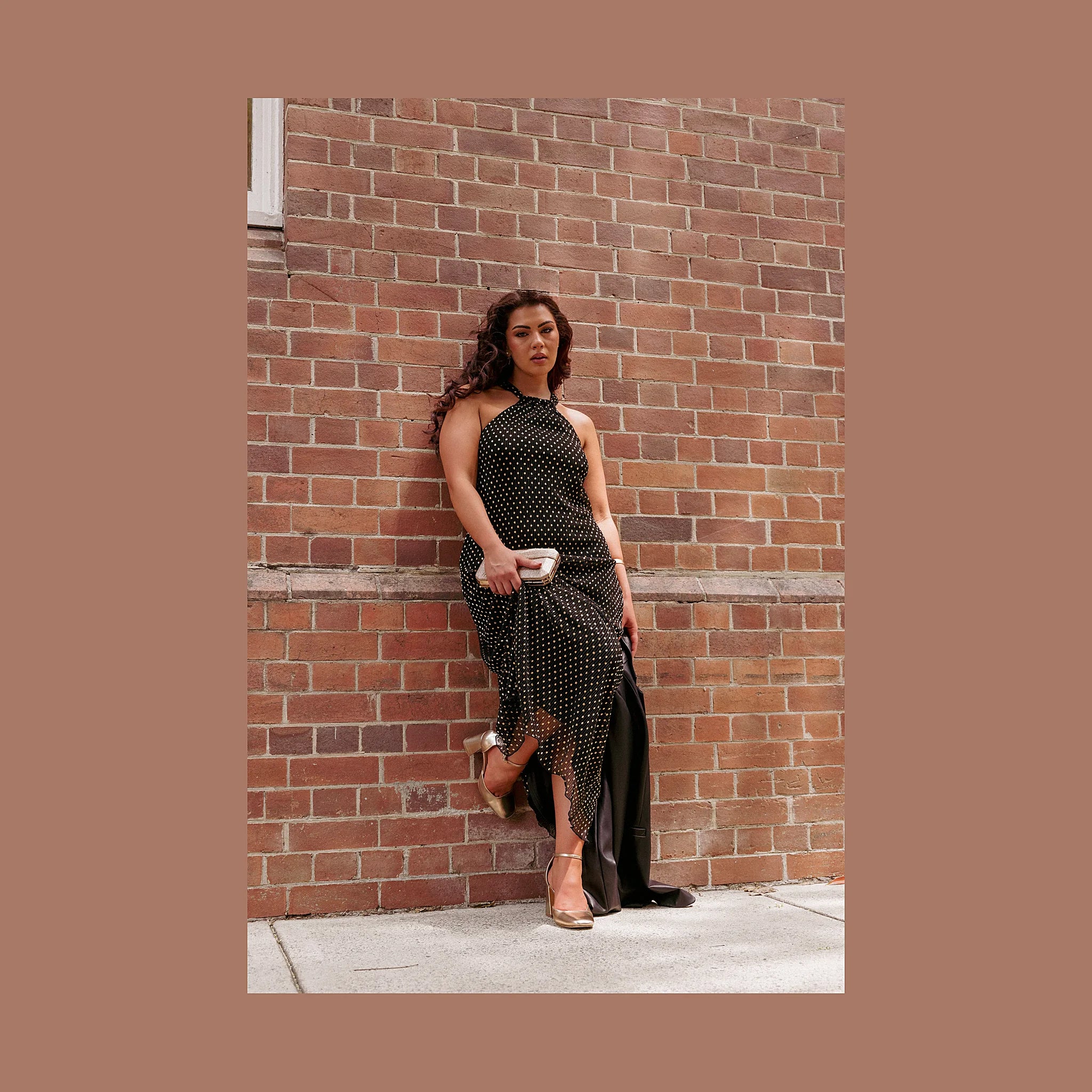 Sleeveless halterneck maxi dress with fine pleating throughout