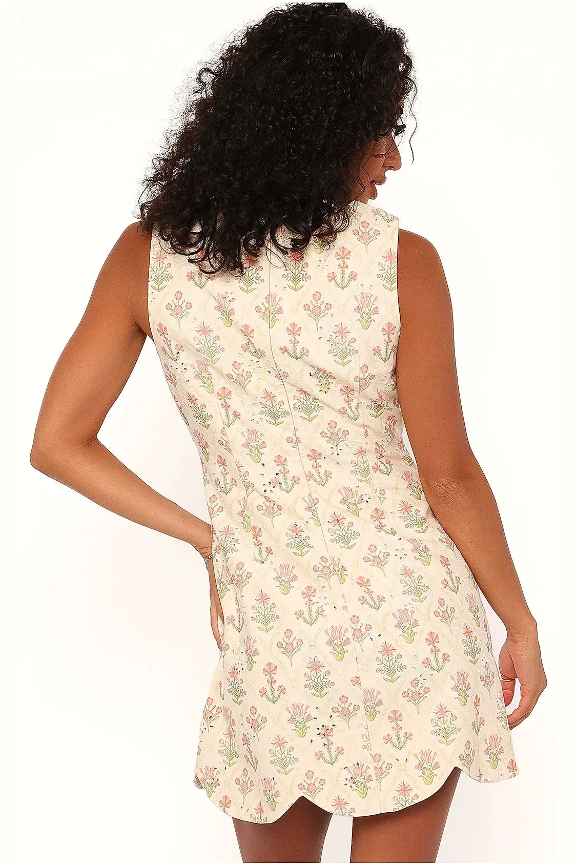 Close view of the floral pattern on the coral cotton mini dress