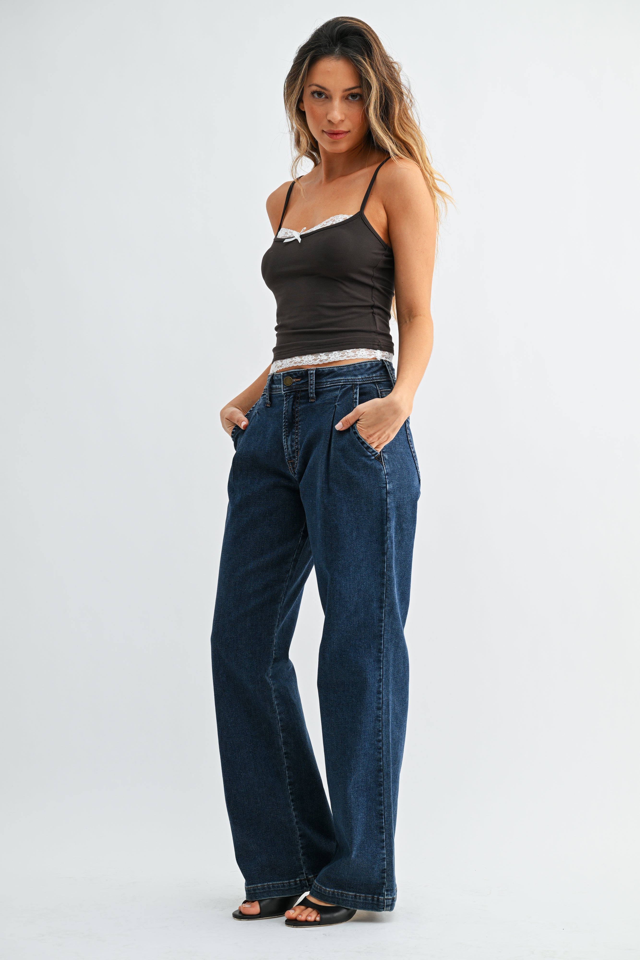 Mid rise waist on a comfort stretch straight leg jean