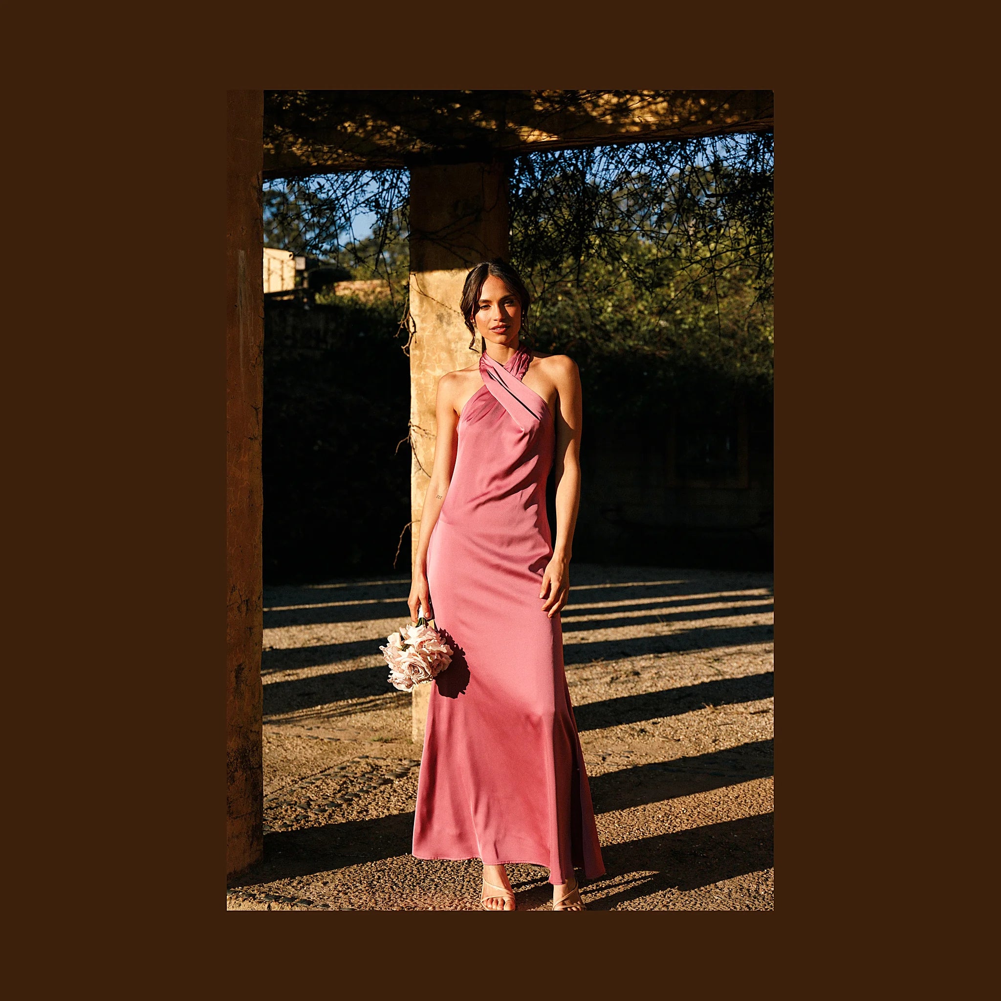 Long dusty pink dress with a satin sheen finish