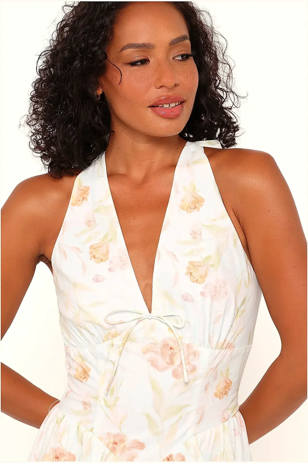 Detail of the halterneck tie on the light mint maxi dress