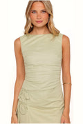 Model photo — green cotton mini dresse, front view on model