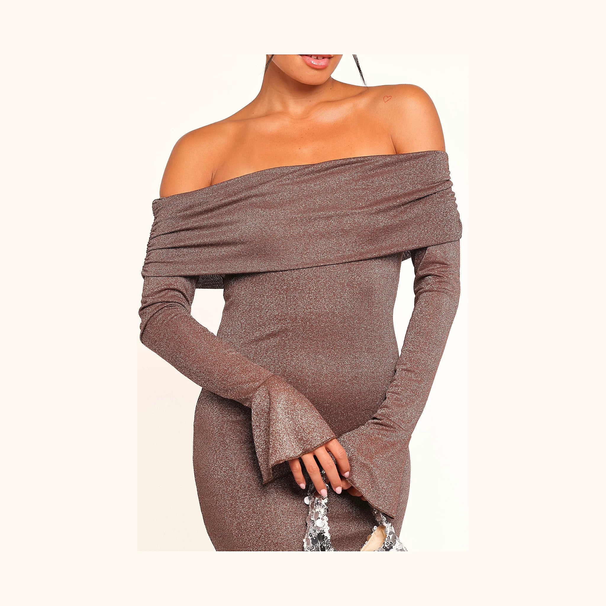Long brown dress with flared cuffs and bare shoulders