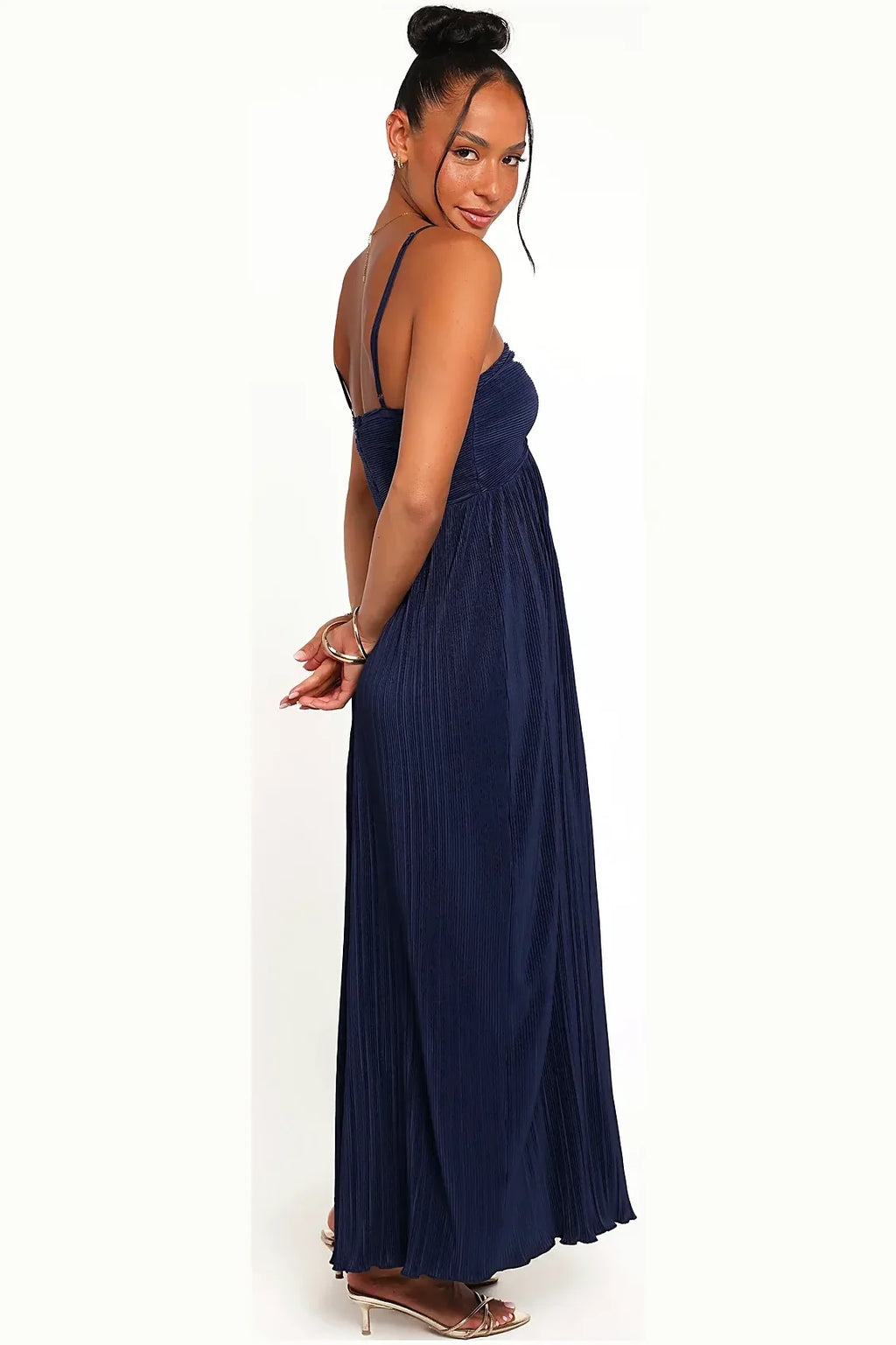 Back view showing the halterneck of the navy maxi dress