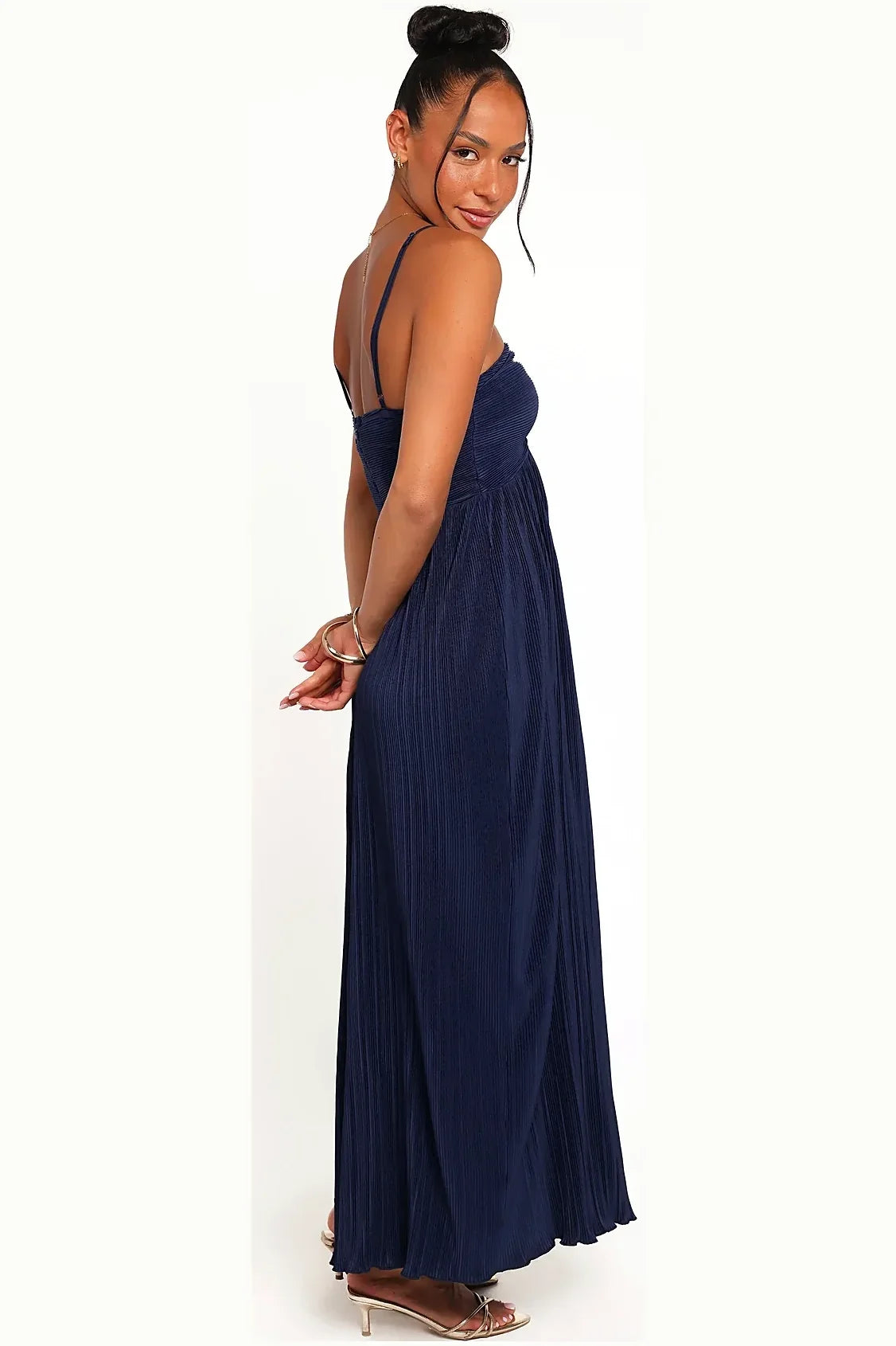 Back view showing the halterneck of the navy maxi dress