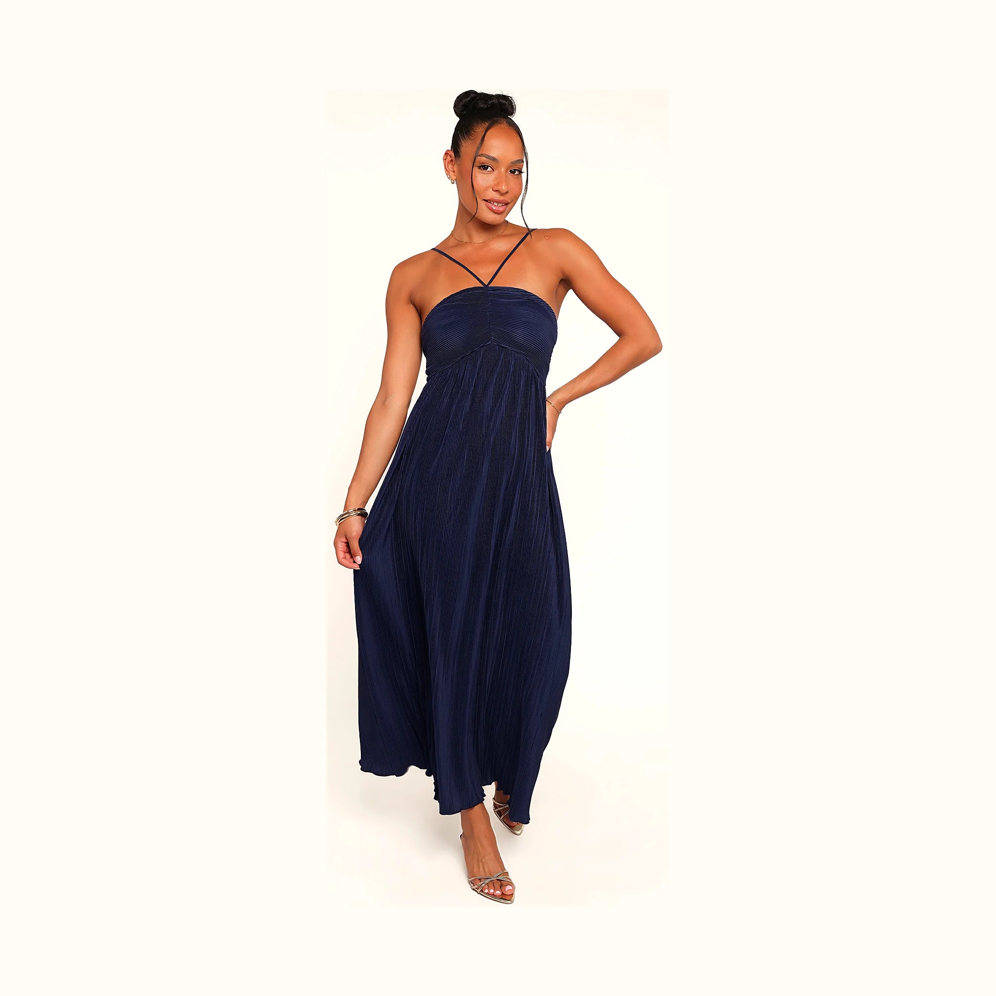 Long navy dress with a halter neckline and open back