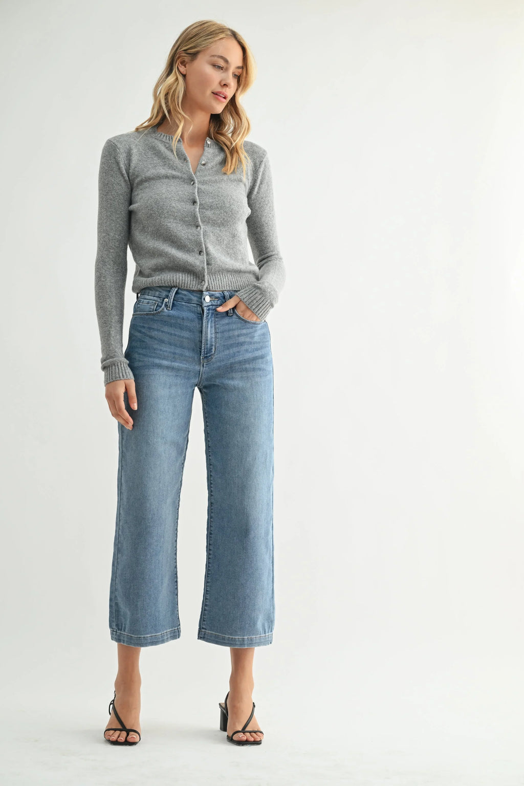 Cropped hem sitting just above the ankle on a wide-leg jean