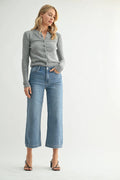 Cropped hem sitting just above the ankle on a wide-leg jean