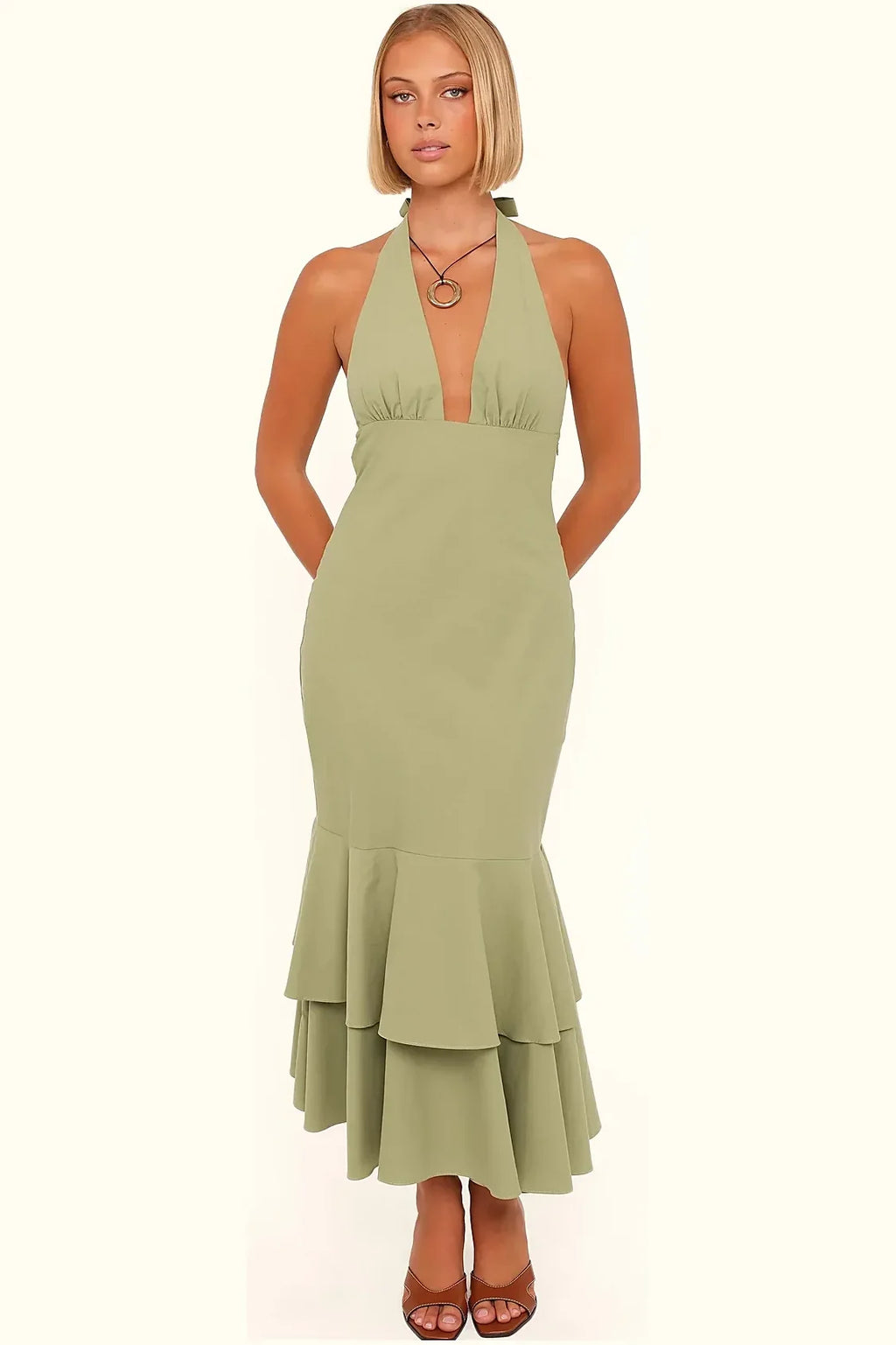 Cotton fabric and halterneck detail on the olive green dress