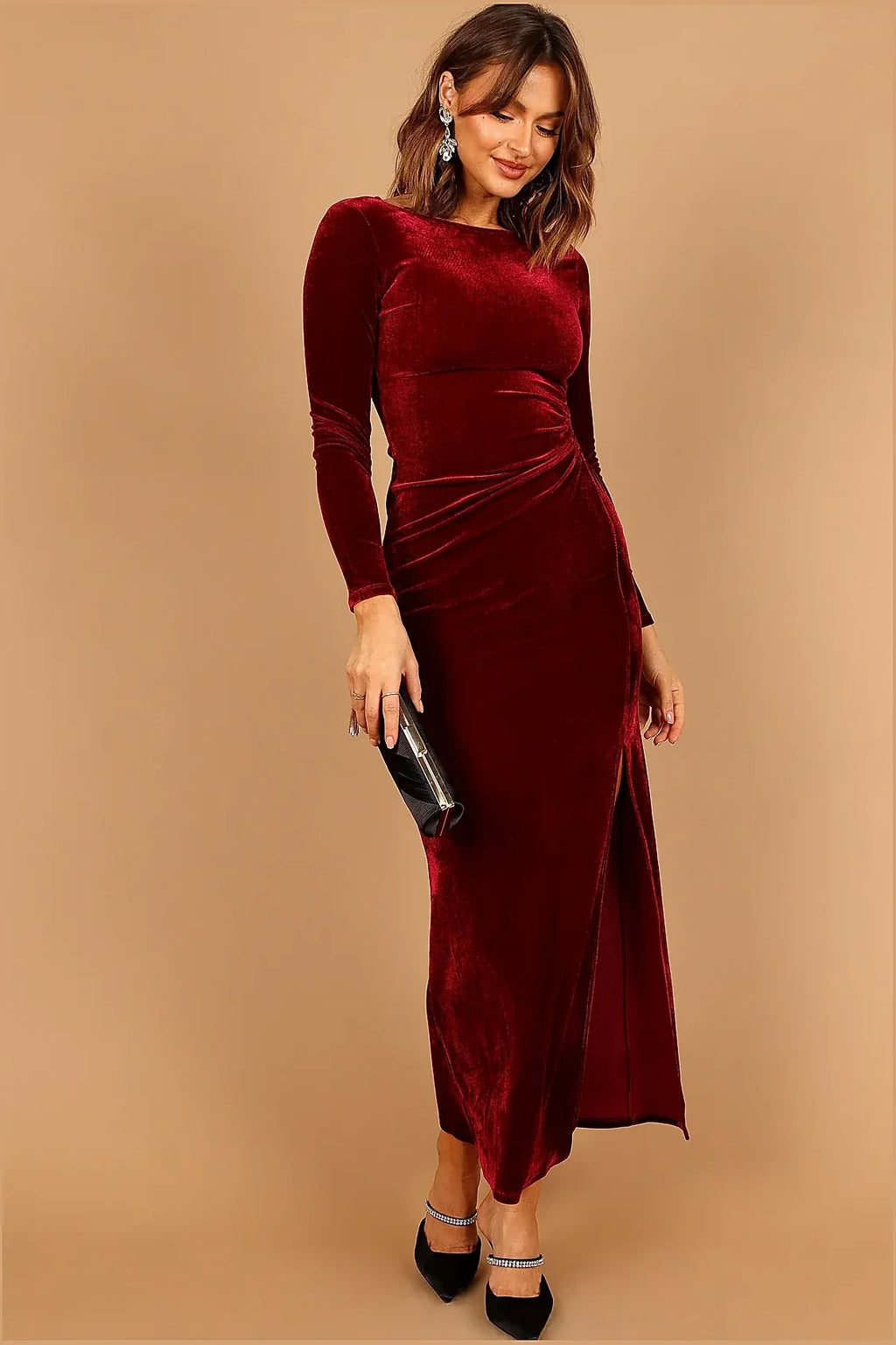 Wine velvet maxi dress shown from the side
