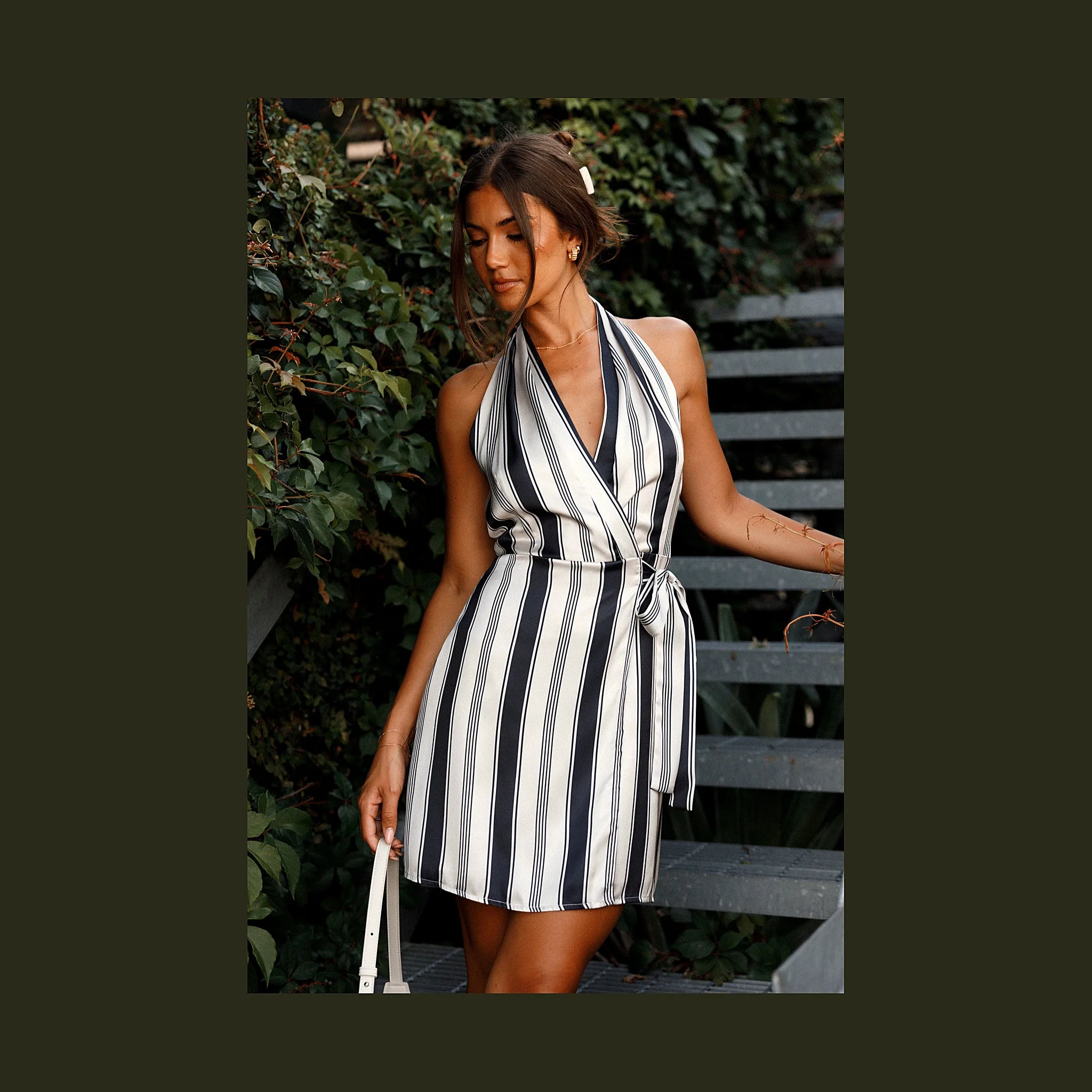 Short sleeveless dress with a wrap front